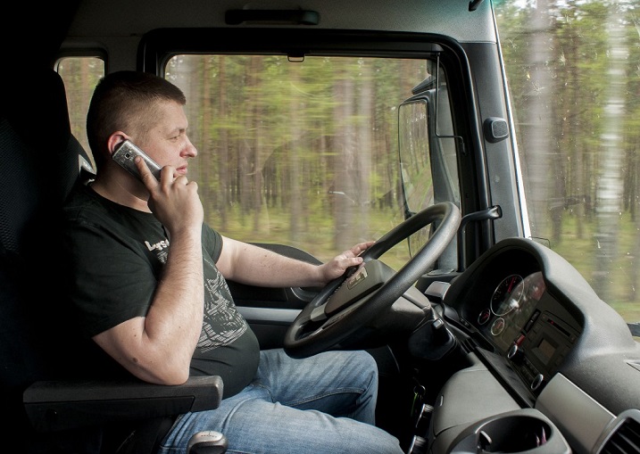 trucker driving talking on cellphone