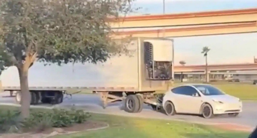 Tesla Model Y tows semi trailer